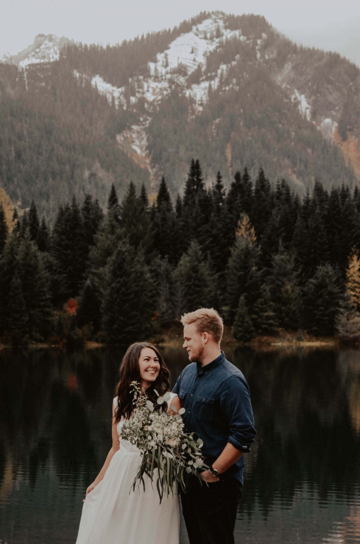 seattle, snoqualmie, elopement, goldcreek, northwest, washington, wedding, photographer, bouquet, moody, trees, lake, mountains, nature, water, white dress, couple, married, fog, reflection, mirror, pnw
