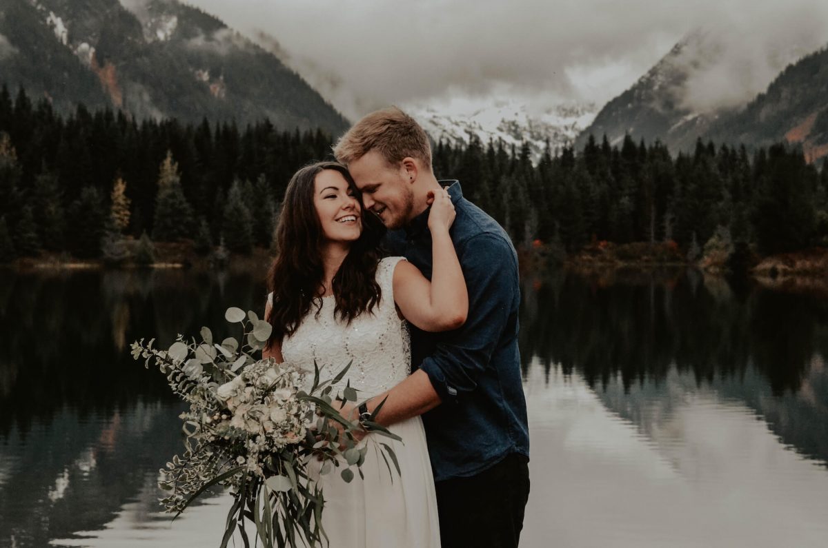 seattle, snoqualmie, elopement, goldcreek, northwest, washington, wedding, photographer, bouquet, moody, trees, lake, mountains, nature, water, white dress, couple, married, fog, reflection, mirror, pnw