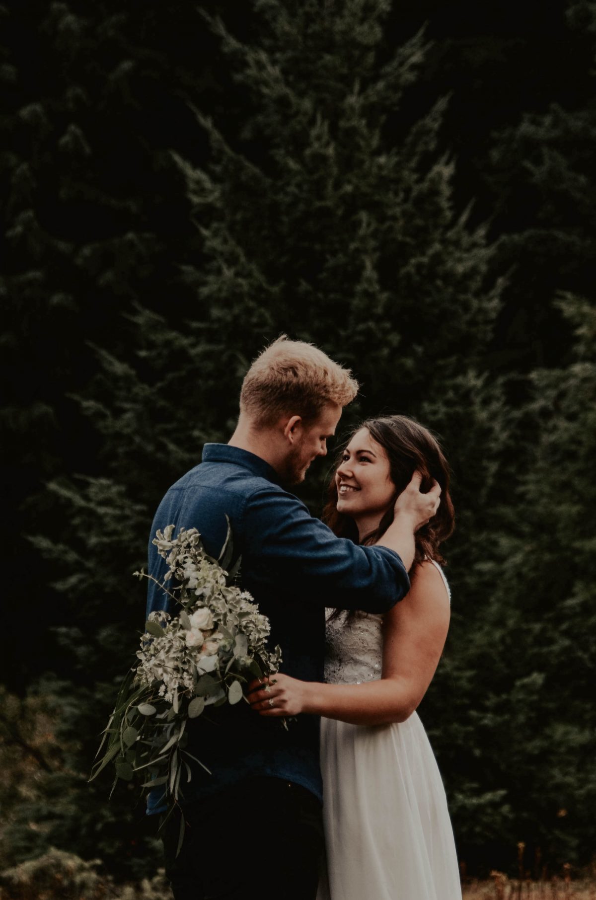 seattle, snoqualmie, elopement, goldcreek, northwest, washington, wedding, photographer, bouquet, moody, trees, lake, mountains, nature, water, white dress, couple, married, fog, reflection, mirror, pnw