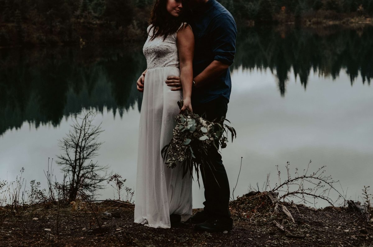 seattle, snoqualmie, elopement, goldcreek, northwest, washington, wedding, photographer, bouquet, moody, trees, lake, mountains, nature, water, white dress, couple, married, fog, reflection, mirror, pnw