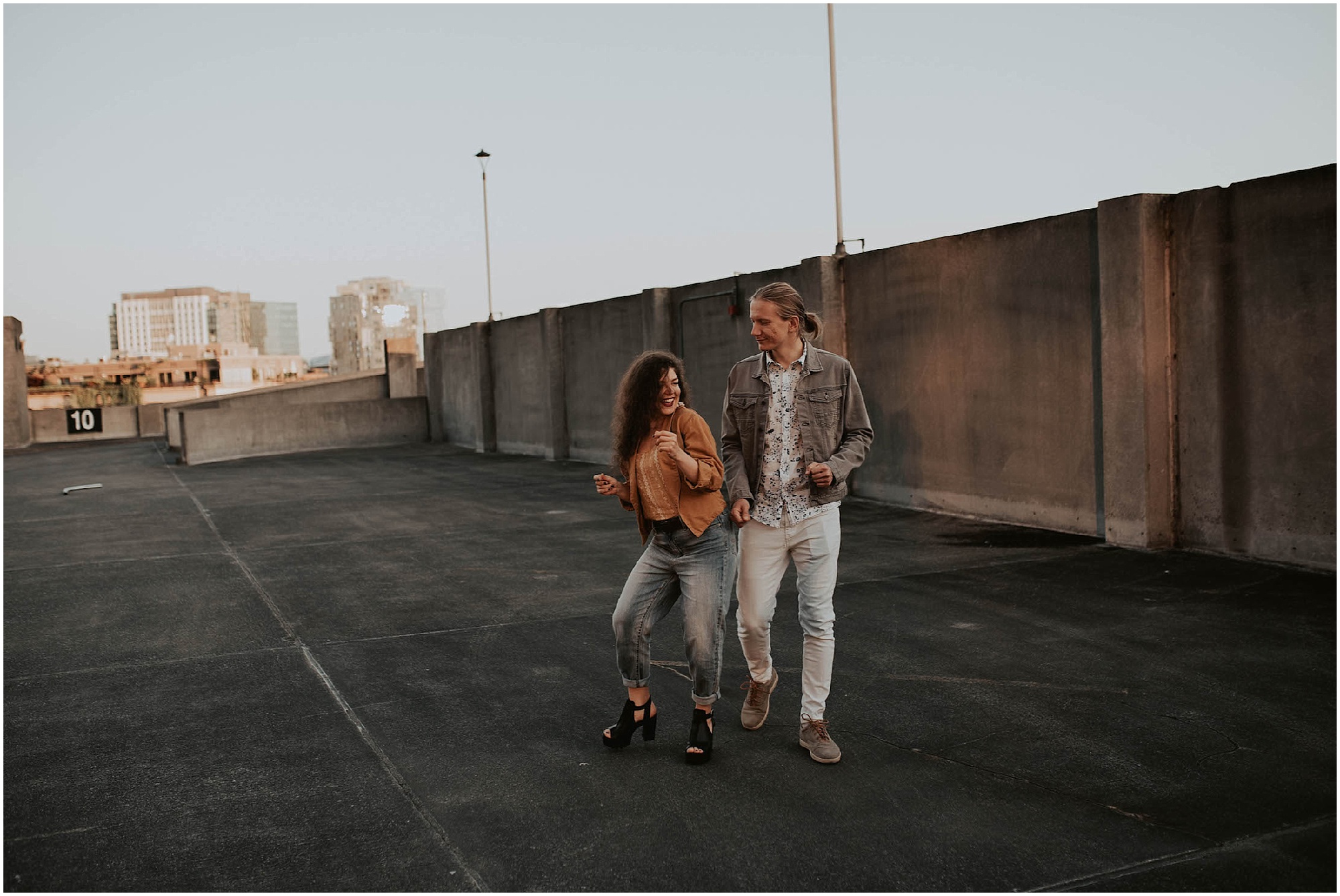 engaged, engagement-photography, engagement-photos, downtown-seattle, seattle-engagement- seattle-wedding-photographer, parking-garage, rooftop-photos, engagement-inspo, sunset-session,
