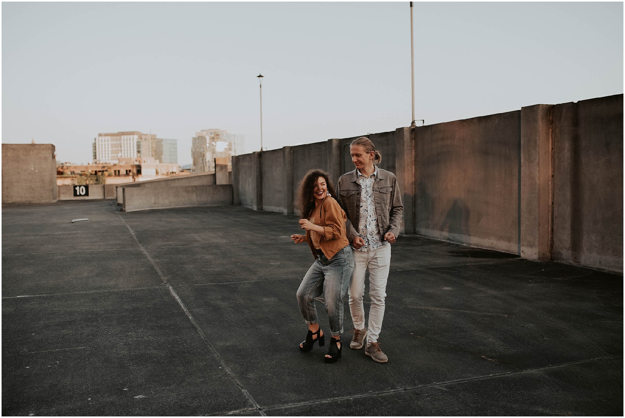 engaged, engagement-photography, engagement-photos, downtown-seattle, seattle-engagement- seattle-wedding-photographer, parking-garage, rooftop-photos, engagement-inspo, sunset-session,