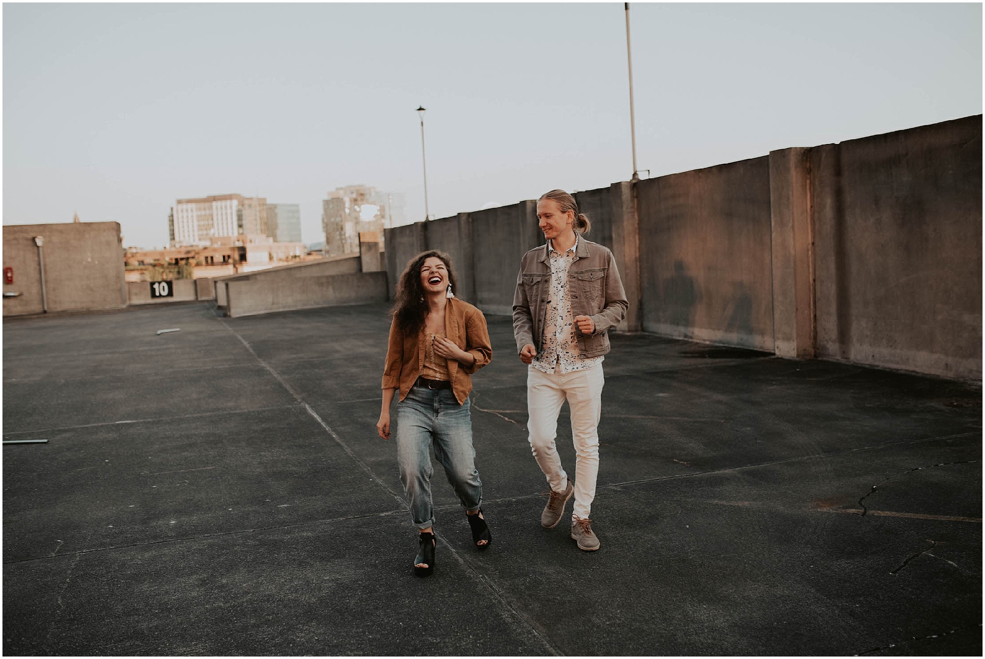 engaged, engagement-photography, engagement-photos, downtown-seattle, seattle-engagement- seattle-wedding-photographer, parking-garage, rooftop-photos, engagement-inspo, sunset-session,