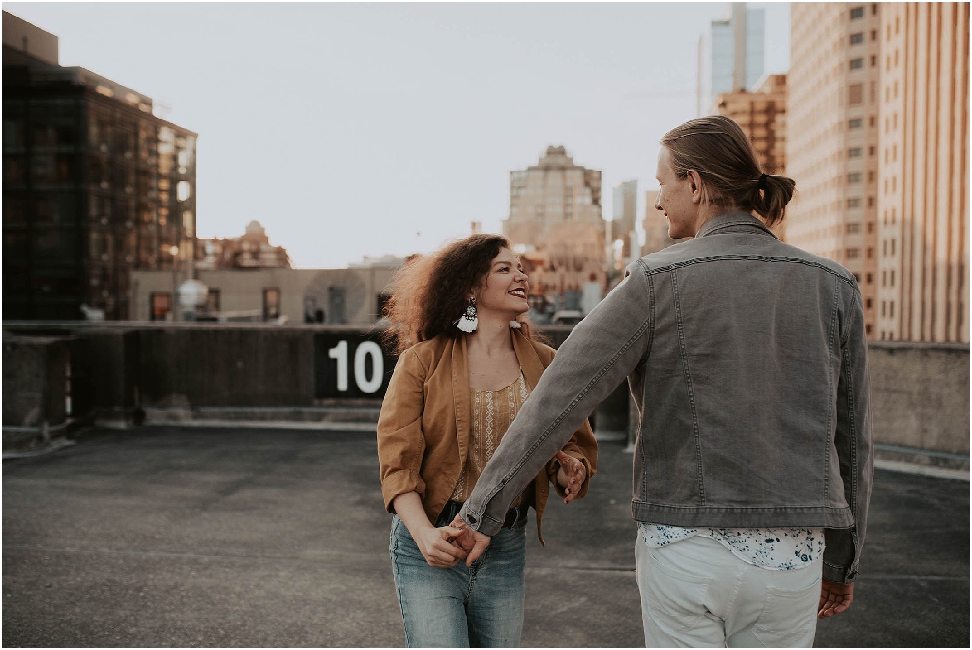 engaged, engagement-photography, engagement-photos, downtown-seattle, seattle-engagement- seattle-wedding-photographer, parking-garage, rooftop-photos, engagement-inspo, sunset-session,