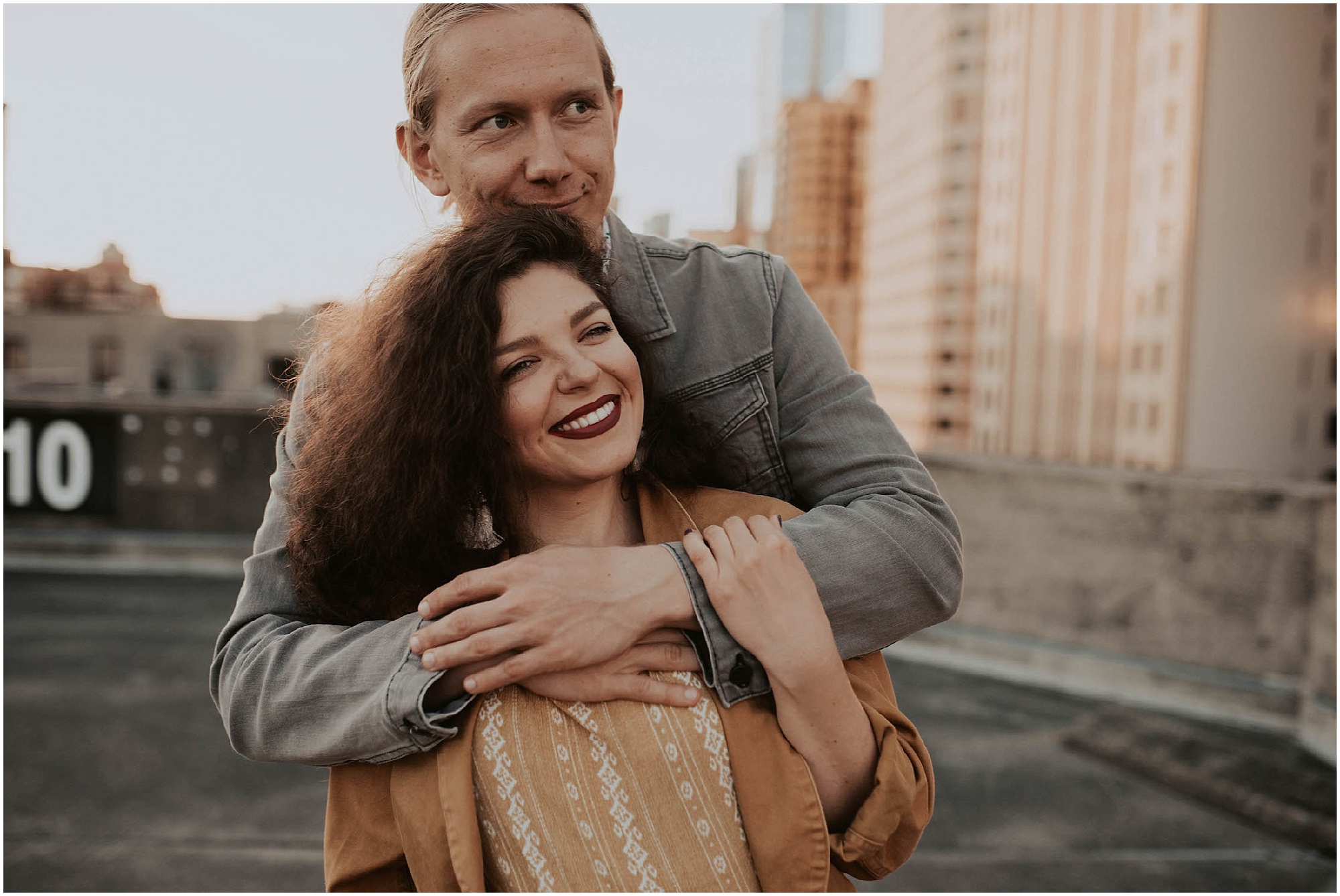 engaged, engagement-photography, engagement-photos, downtown-seattle, seattle-engagement- seattle-wedding-photographer, parking-garage, rooftop-photos, engagement-inspo, sunset-session,