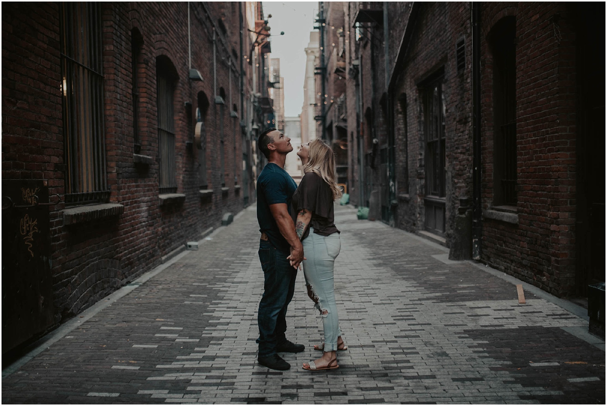 engaged, engagement-photography, engagement-photos, Pioneer-Square, seattle-engagement- seattle-wedding-photographer, Pioneer-Square-Photos, City-Couple, engagement-inspo, Washington-Engagement-Session, Downtown-Seattle-Engagement, Rooftop-Engagement, Seahawk Couple, Seahawk Fans,