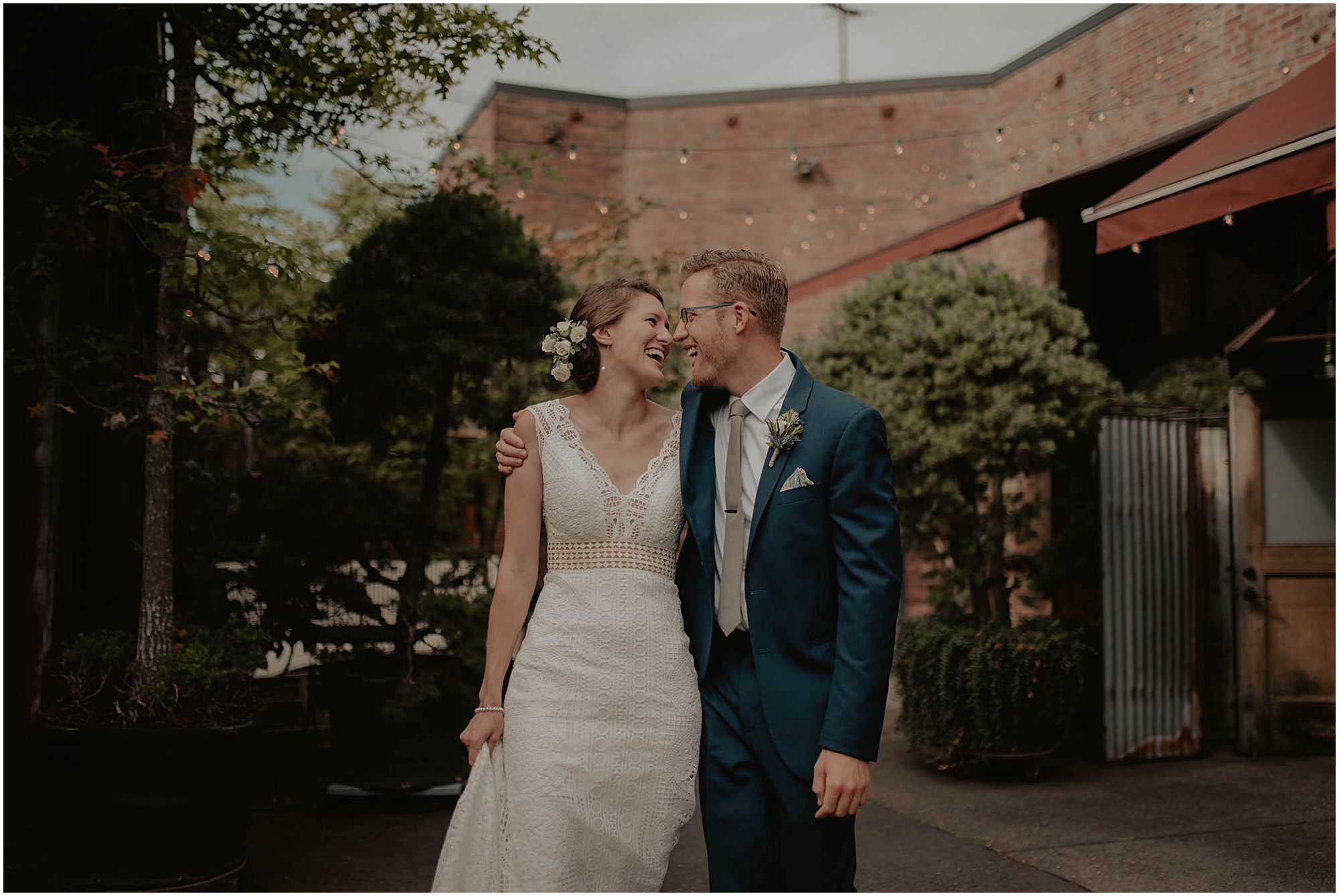 laughing couple on wedding day