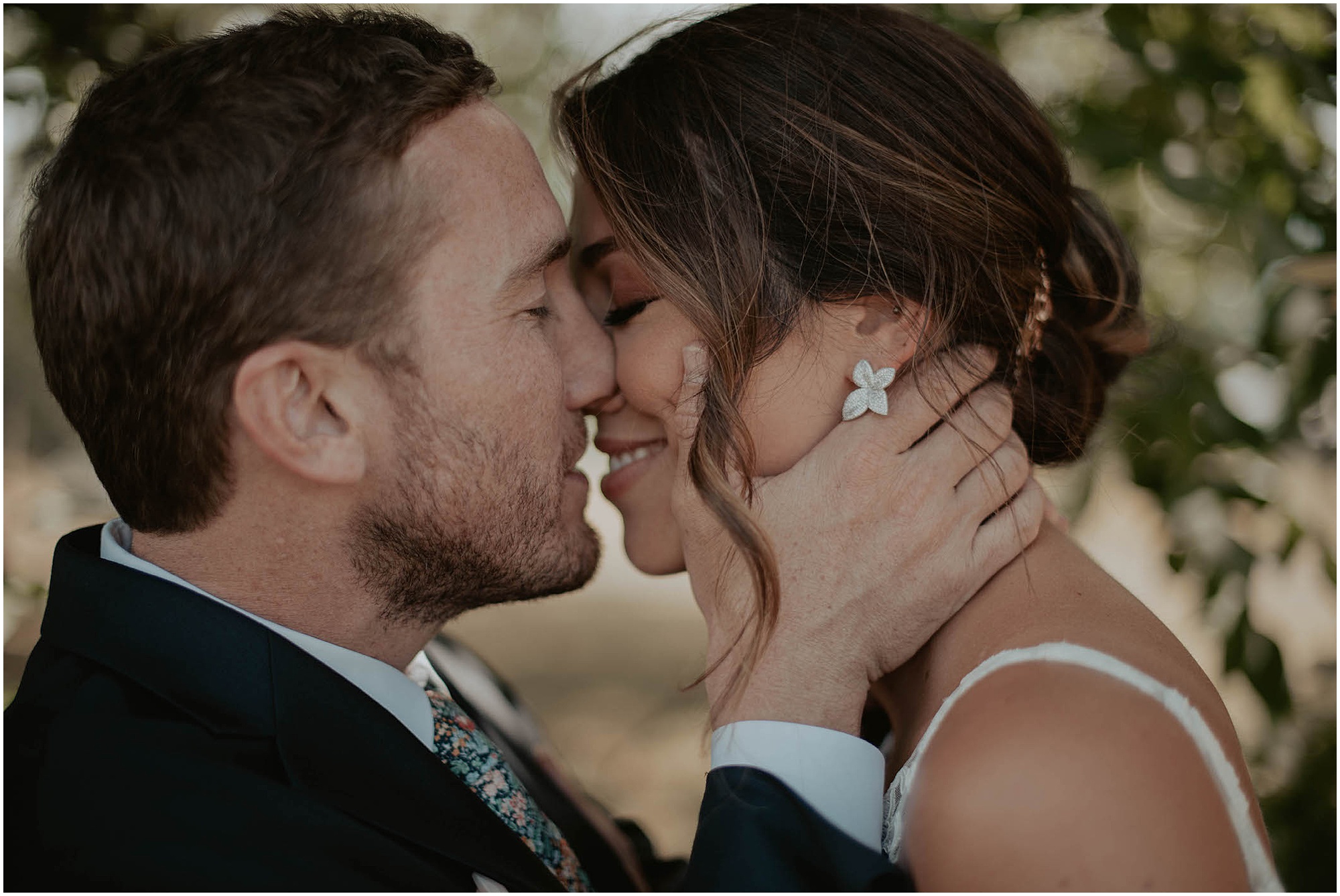 bride and groom kissing on wedding day,