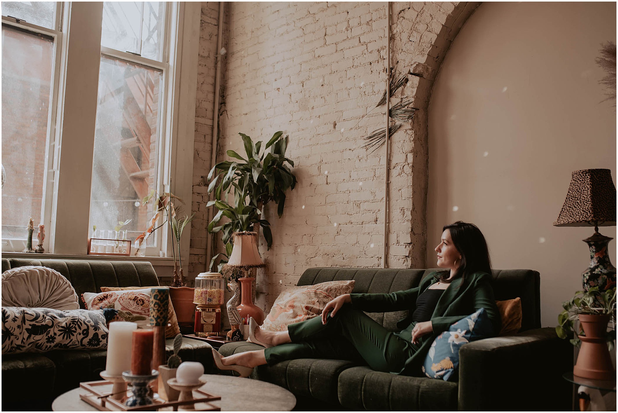 green velvet couch in downtown seattle loft