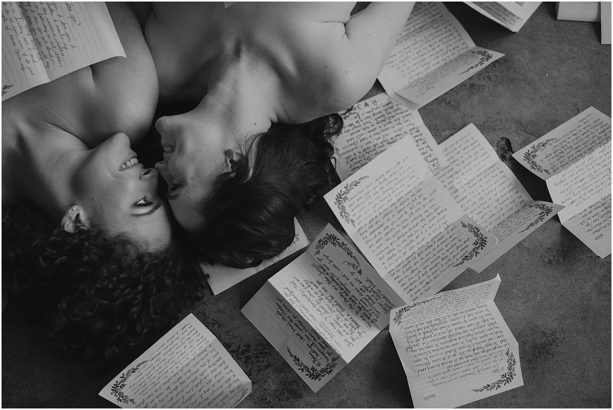 couple surrounded by lover letters