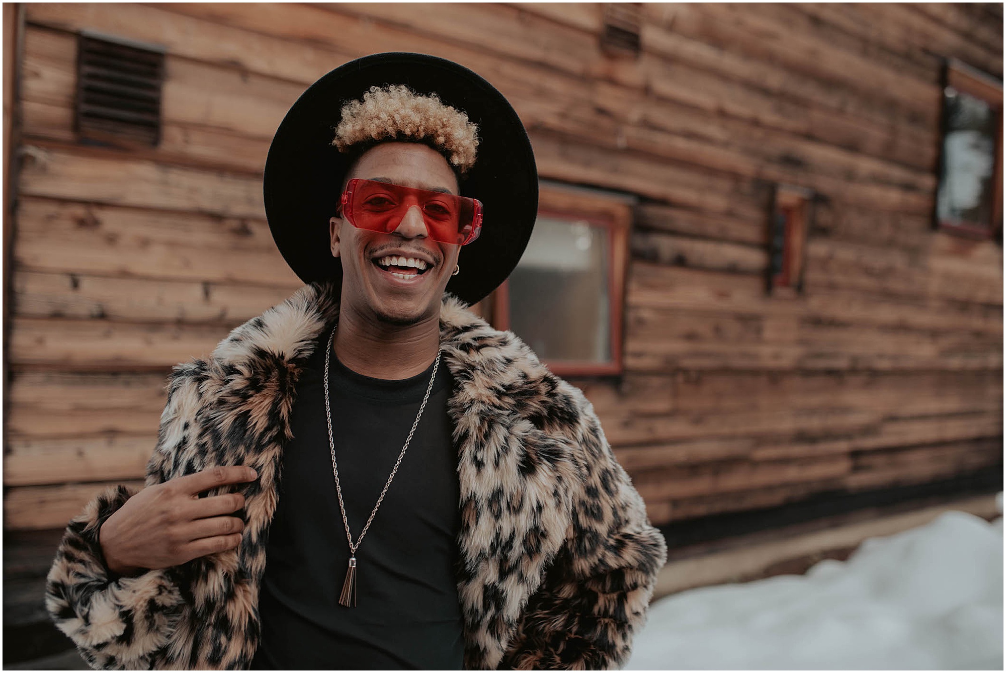 red sunglasses and cheetah fur coat