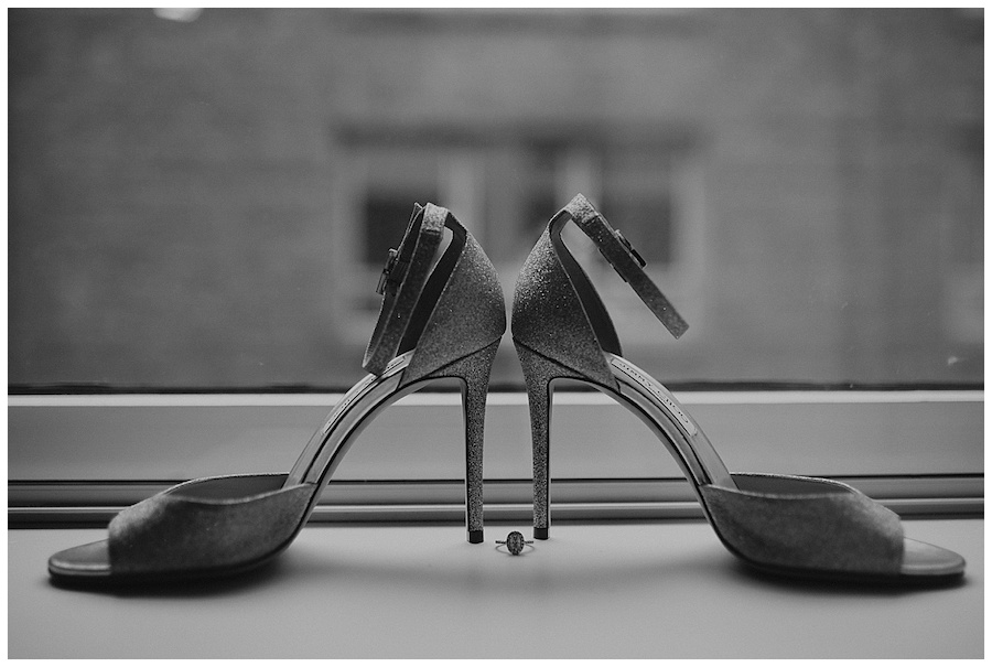 jimmy choo heels on hotel window in downtown seattle