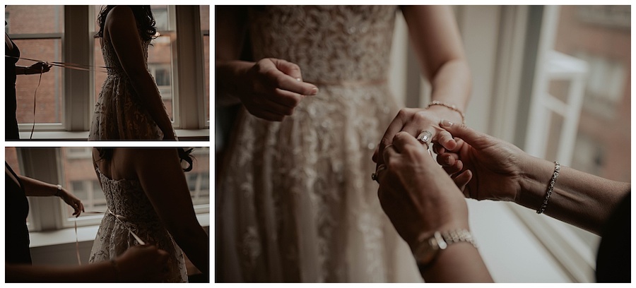 mom helping getting her daughter dressed on her wedding day