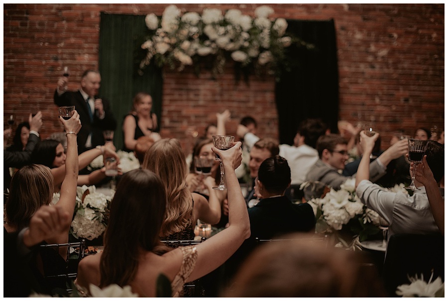 Champagne toasts during wedding at axis pioneer square
