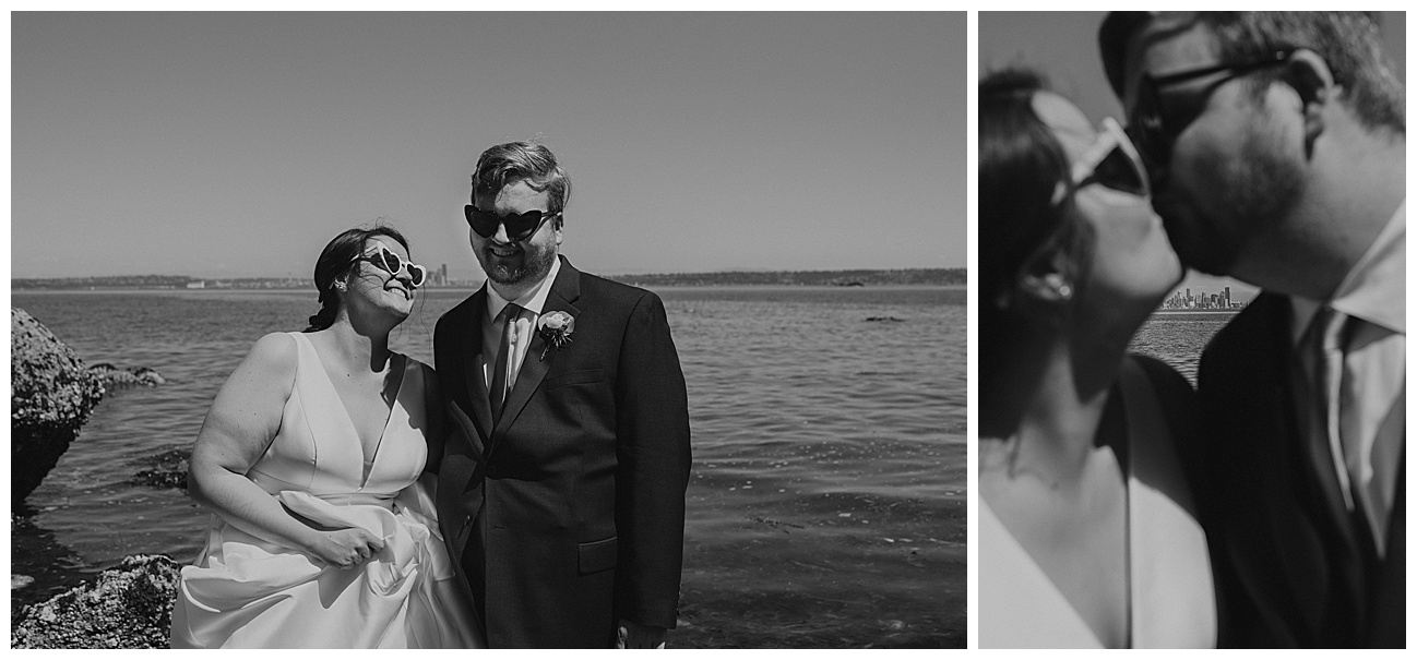 bride and groom wearing heart shaped glasses on wedding day with puget sound behind them
