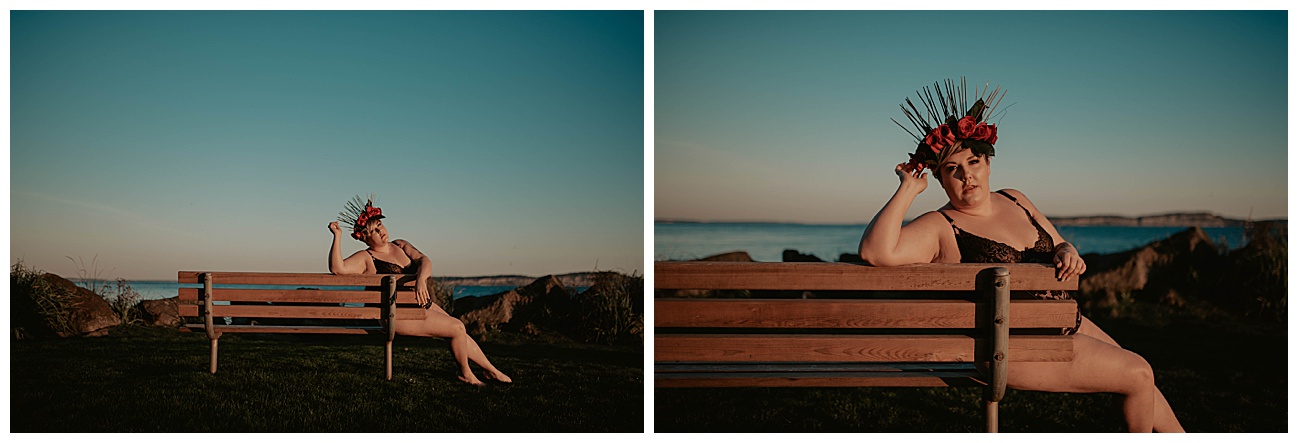 woman sitting on bench at beach with ocean behind her wearing a DIY crown and black underwear