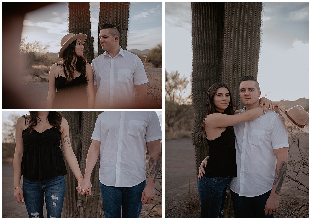 couple posing in front of 12 foot cactus for their arizona engagement photos