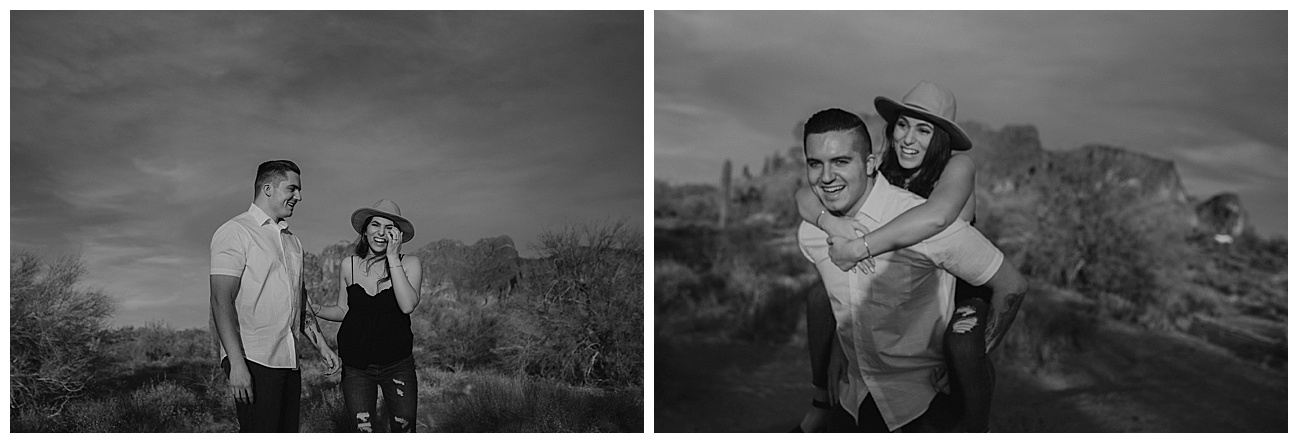 woman in hat being carried by her fiance in arizona desert