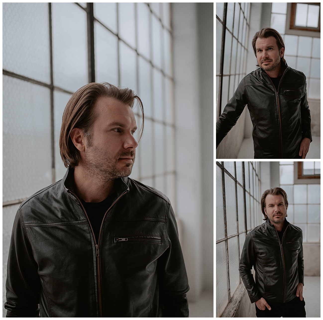 man in black leather outfit posing next to loft style windows in studio