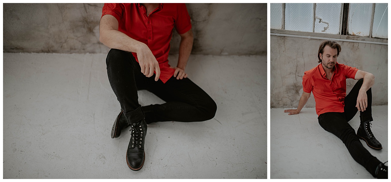 man wearing black pans and red shirt in seattle studio