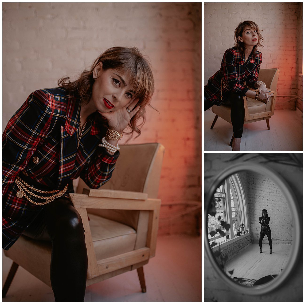  woman sitting on tan leather chair in red plaid jacket and gold chains