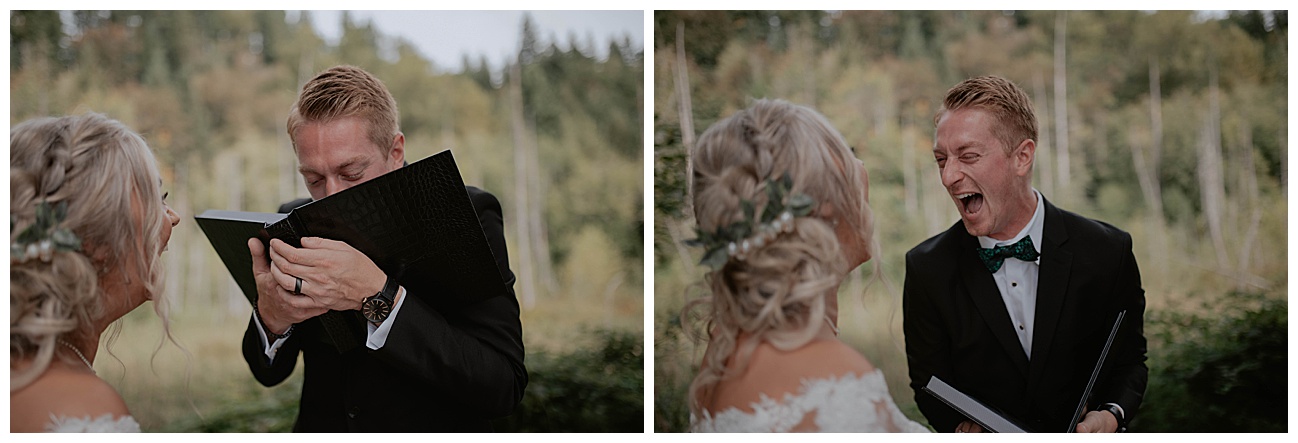 groom looking at boudoir album on wedding day