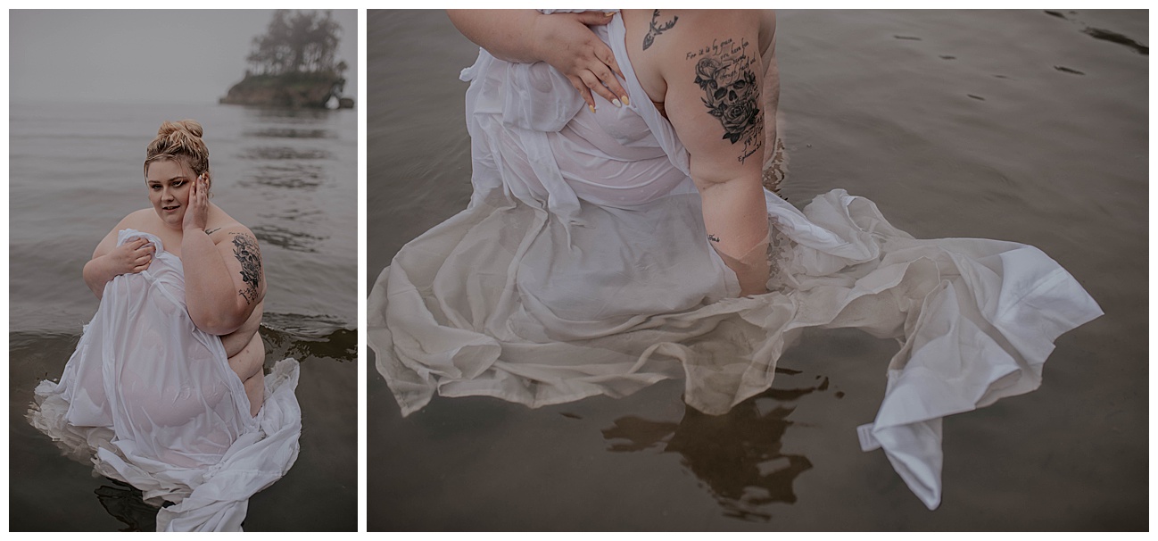 tattooed woman wearing a white sheet in PNW ocean 