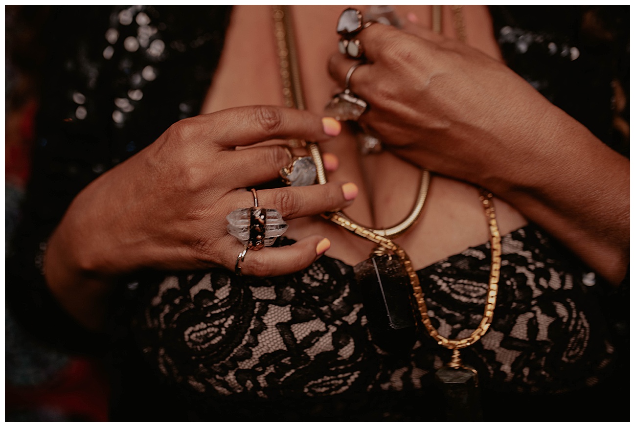 woman wearing vintage chains and Crystal rings in seattle store