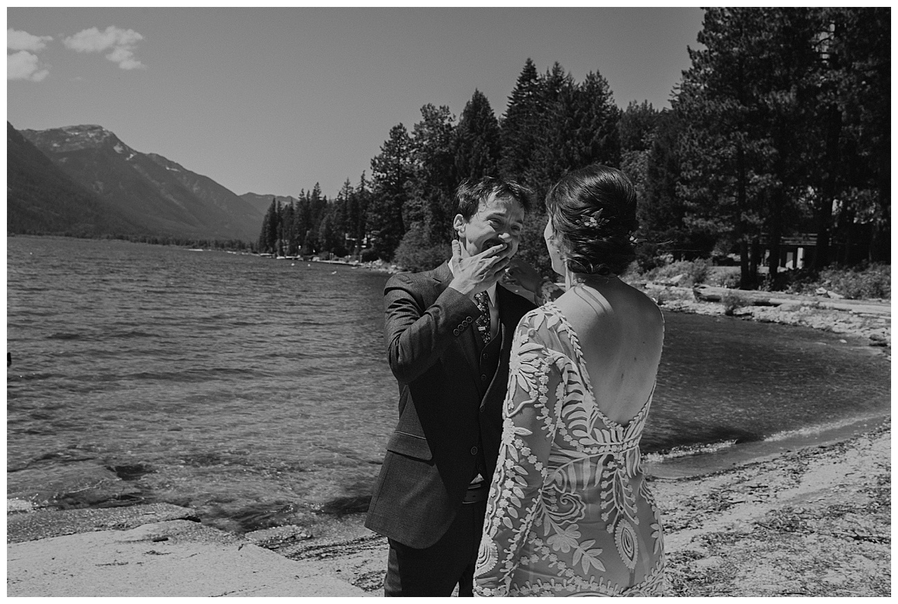 first look with bride and groom on lake