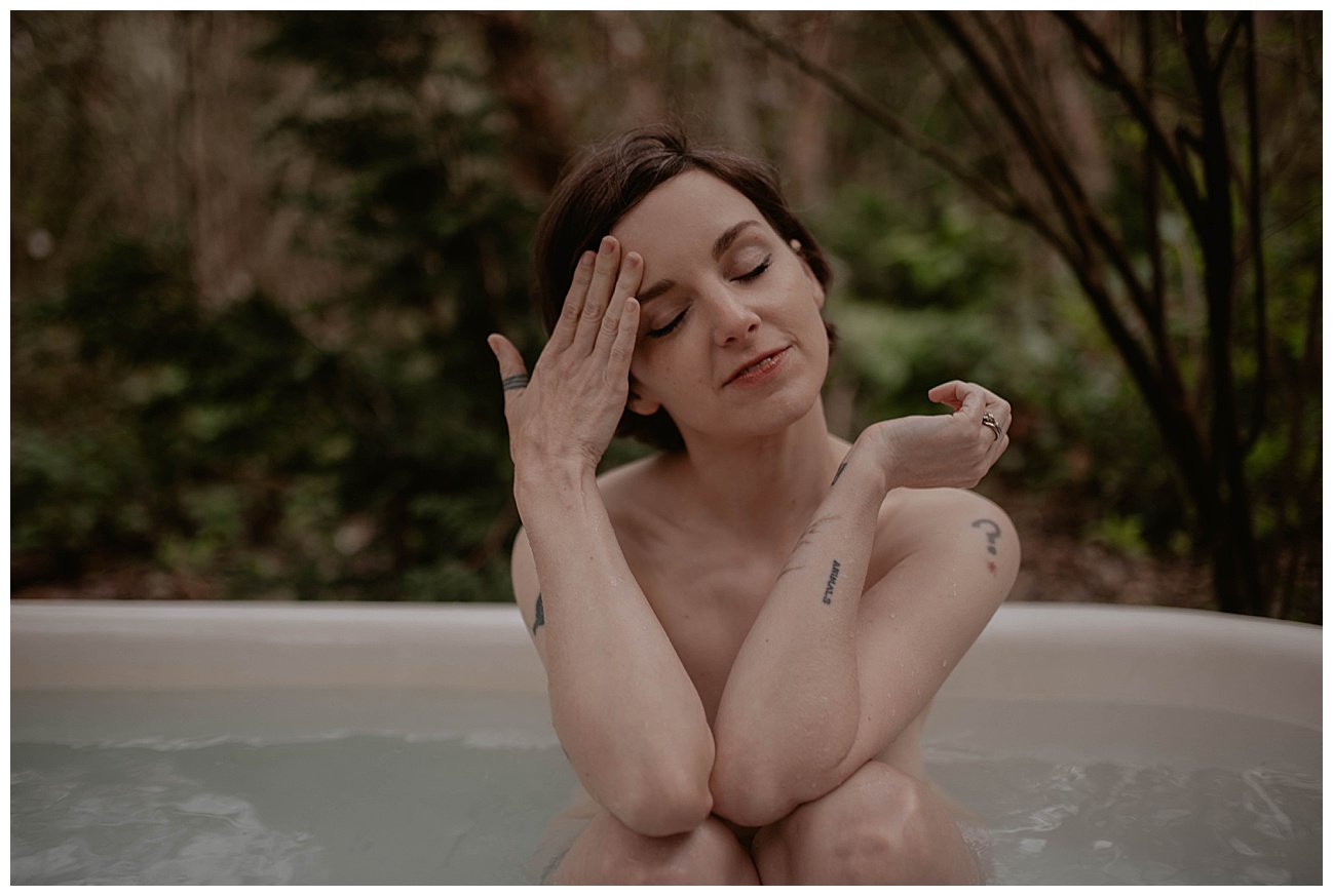 Tatted woman, outdoor clawfoot bathtub, outdoor boudoir, bath boudoir