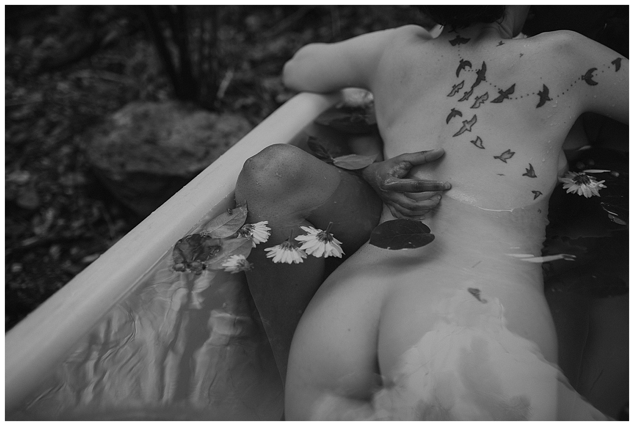 bird tattoo on woman, outdoor clawfoot bathtub, outdoor boudoir, bath boudoir, flowers in water, couple in bathtub